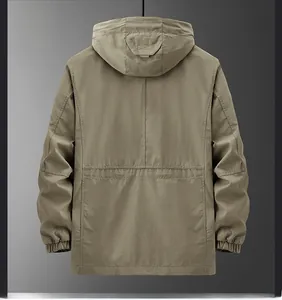 Detail view of khaki hooded jacket back with elastic cuffs and windproof fabric texture