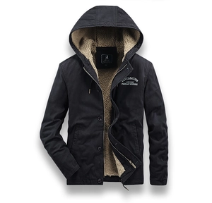 Detail of men's thick black jacket featuring warm sherpa lining and vintage chest print