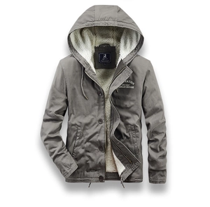Detail of grey men's workwear jacket with thick white lamb wool lining and zipper