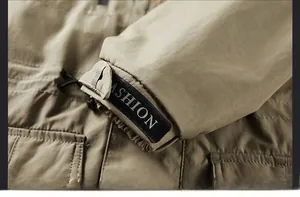 Close-up of windproof jacket cuff with adjustable velcro strap and ASHION text