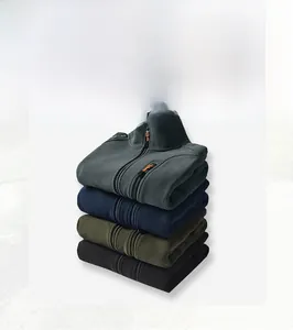 Stack of fleece vests in dark grey, navy, army green and black with zipper pockets