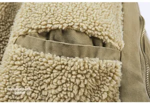 Detail showing inner patch pocket and thick lamb wool lining of the winter deck jacket