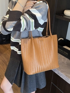 Vintage brown woven tote bag for women featuring large capacity and stylish PU leather texture