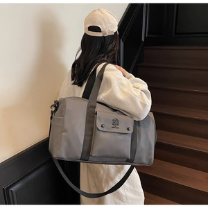Gray large capacity gym bag with waterproof fabric and detachable shoulder strap