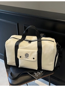 Cream large capacity gym bag with dry wet separation and adjustable shoulder strap