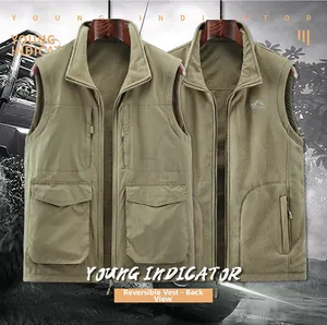 Detail showing reversible fleece vest with multi-pocket design in army green for outdoor use