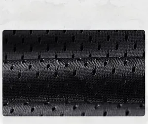 Macro detail of breathable black mesh lining on a men's outdoor sport jacket