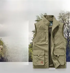 Detail of army green outdoor vest showing multiple cargo pockets and mesh lining