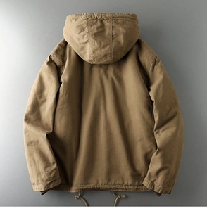 Detail view of khaki heavy-duty canvas work jacket featuring hooded back and drawstring hem