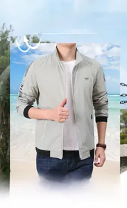 Detail of light grey outdoor quick-dry sun protection jacket with black trim