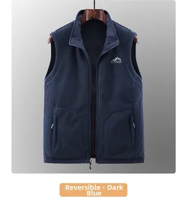 Detail of dark blue reversible fleece vest with stand collar and outdoor branding