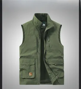 Detail of military green tactical vest featuring functional pockets and breathable mesh lining