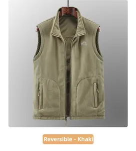Detail of khaki reversible polar fleece vest with standing collar and outdoor embroidery