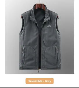 Detail of grey outdoor fleece gilet showing standing collar and embroidered chest logo