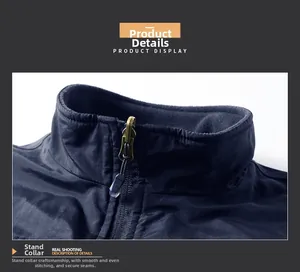 Detail of navy polar fleece vest featuring a stand-up collar and smooth metal zipper