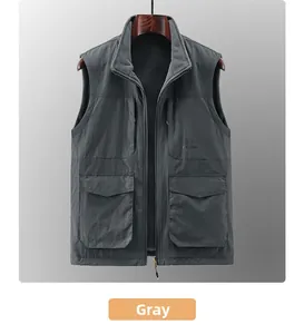 Detail of gray fleece-lined outdoor vest featuring four large utility pockets and stand collar