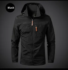 Detail view of the outdoor hooded windbreaker with chest zipper and mountain logo