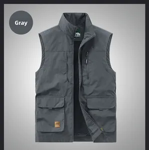 Detail of gray outdoor vest showing multi-pocket design and breathable mesh lining