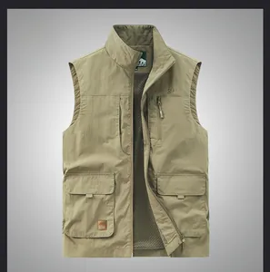 Detail of khaki outdoor vest showing multiple pockets and breathable mesh lining