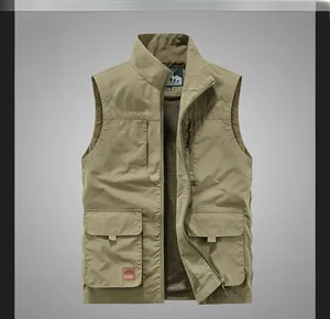 Detail of khaki outdoor utility vest featuring multi-pockets and breathable mesh lining
