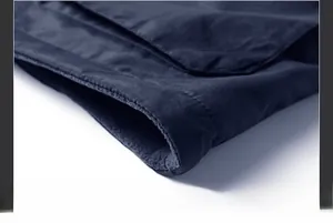 Detailed close-up of smooth stitching and warm fleece lining on a men's winter vest
