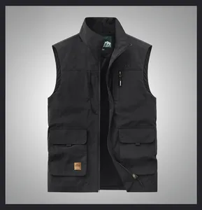 Detail of black utility vest with four cargo pockets and breathable mesh lining