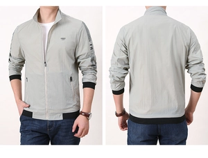 Front and back view of a light gray windproof jacket with Free Spirit print detail