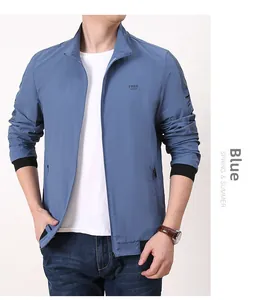 Detail of men's quick-dry navy jacket with Free Spirit print and sporty stripes
