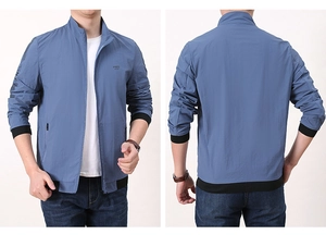 Front and back detail of blue sports jacket with stand collar and FREE SPORT logo