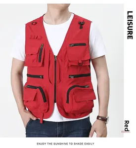 Detail of red tactical multi-pocket fishing vest with functional hooks and zippers