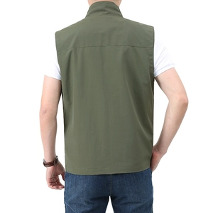Men's outdoor utility vest with stand collar in army green, back view on male model