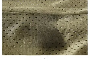 Détail de l'étiquette d'entretien montrant le tissu 100% nylon et la doublure filet
