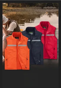 Detail of breathable mesh lining and reflective strips on multi-pocket outdoor vest