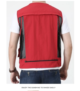 Detail of red tactical fishing vest with breathable black mesh back and zipper pocket