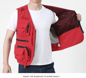Red tactical vest with multiple pockets and breathable black mesh lining for fishing
