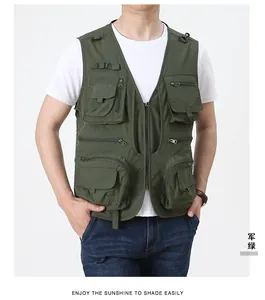 Detail of army green multi-pocket utility vest with D-ring and zipper pockets