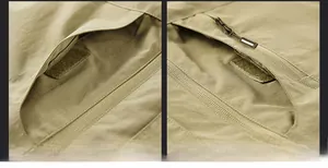 Detail of khaki outdoor vest showing functional zipper and velcro utility pockets