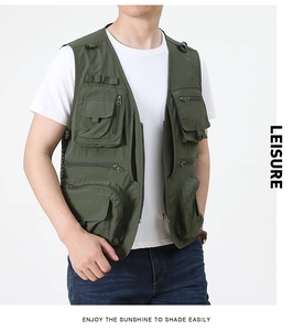 Detail view of army green tactical cargo vest with multiple utility pockets and durable fabric