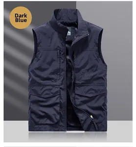 Detailed view of deep blue outdoor utility vest with functional pockets and stand collar