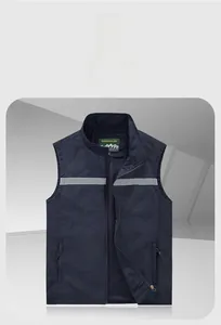 Detail of navy blue outdoor vest featuring reflective stripes and breathable mesh lining