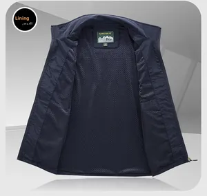 Detail of navy blue outdoor vest featuring breathable mesh lining and brand size label