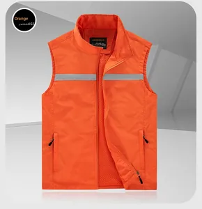 Detail view of orange outdoor vest showing breathable mesh lining and reflective safety strip