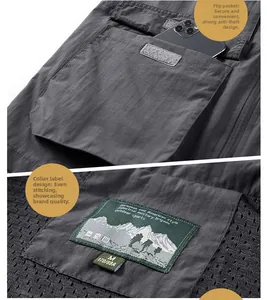 Detail of outdoor vest featuring anti-theft flap pockets and breathable mesh lining texture