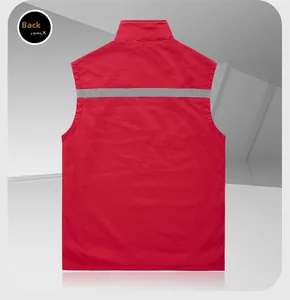 Rear view of red safety vest featuring a wide high-visibility grey reflective strip