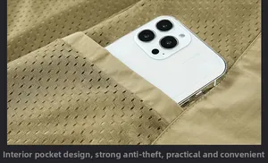 Detail of khaki outdoor vest showing breathable mesh lining and a secure inner pocket