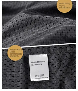 Detail of breathable black mesh fabric and care label on nylon fishing vest