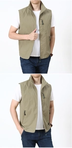 Detail view of khaki quick-dry outdoor vest with multi-zippered pockets and stand collar