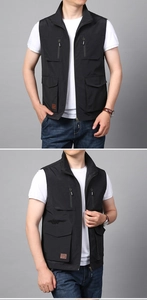 Dettaglio di un gilet multitasche da uomo nero con design funzionale per l'outdoor
