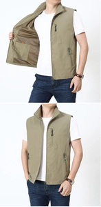 Detail of khaki outdoor vest showing breathable mesh lining and hidden zipper pockets