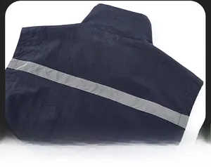 Detail of navy blue outdoor vest featuring a silver reflective strip and precise stitching